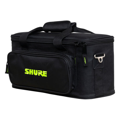 SH-MICBAG12 microphone bag angled front-right view showing carry handles, front zip pocket with green Shure logo and metal D-ring shoulder strap attachment, Gator
