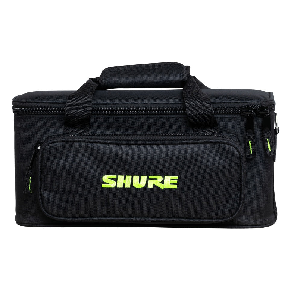SH-MICBAG12 microphone bag straight-on front view showing padded top handle, zippered front pocket with green Shure embroidery and green zipper pulls, Gator
