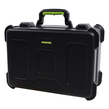 SH-MICCASE15 molded mic case angled front view from the left showing green-accent carry handle, TSA latches and Shure logo plate, Gator