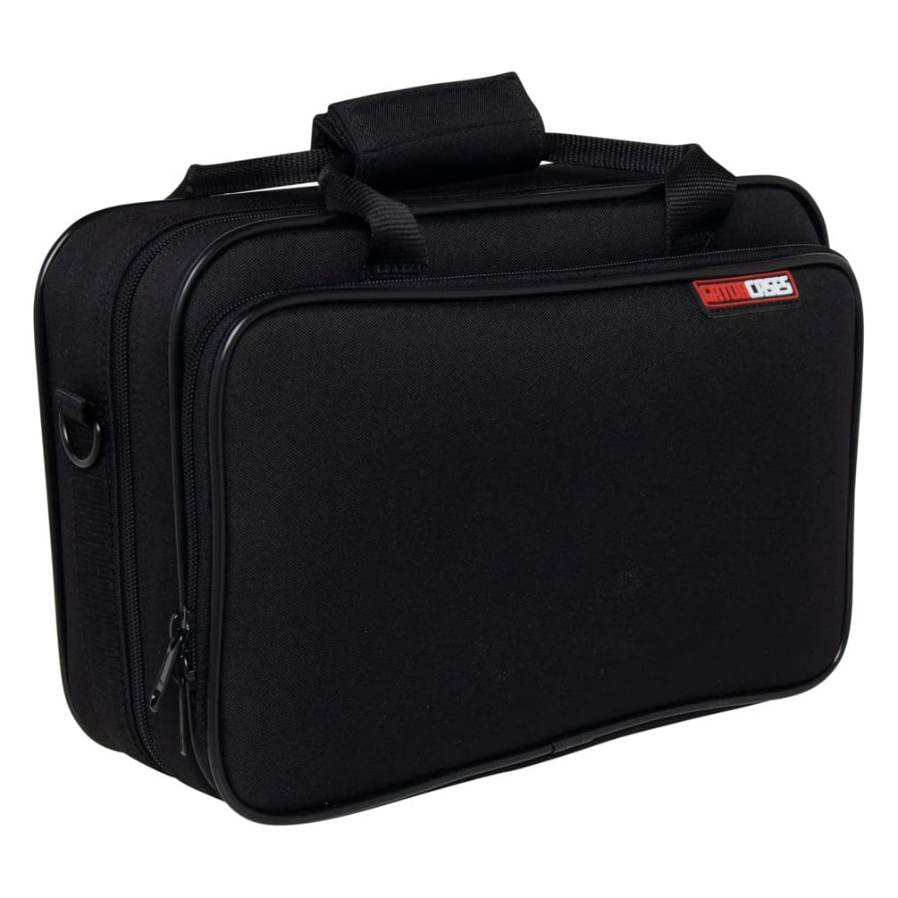 GBB-CLARINET beginner clarinet case angled front-right view showing side zipper pull, shoulder strap D-ring and GatorCases logo, Gator