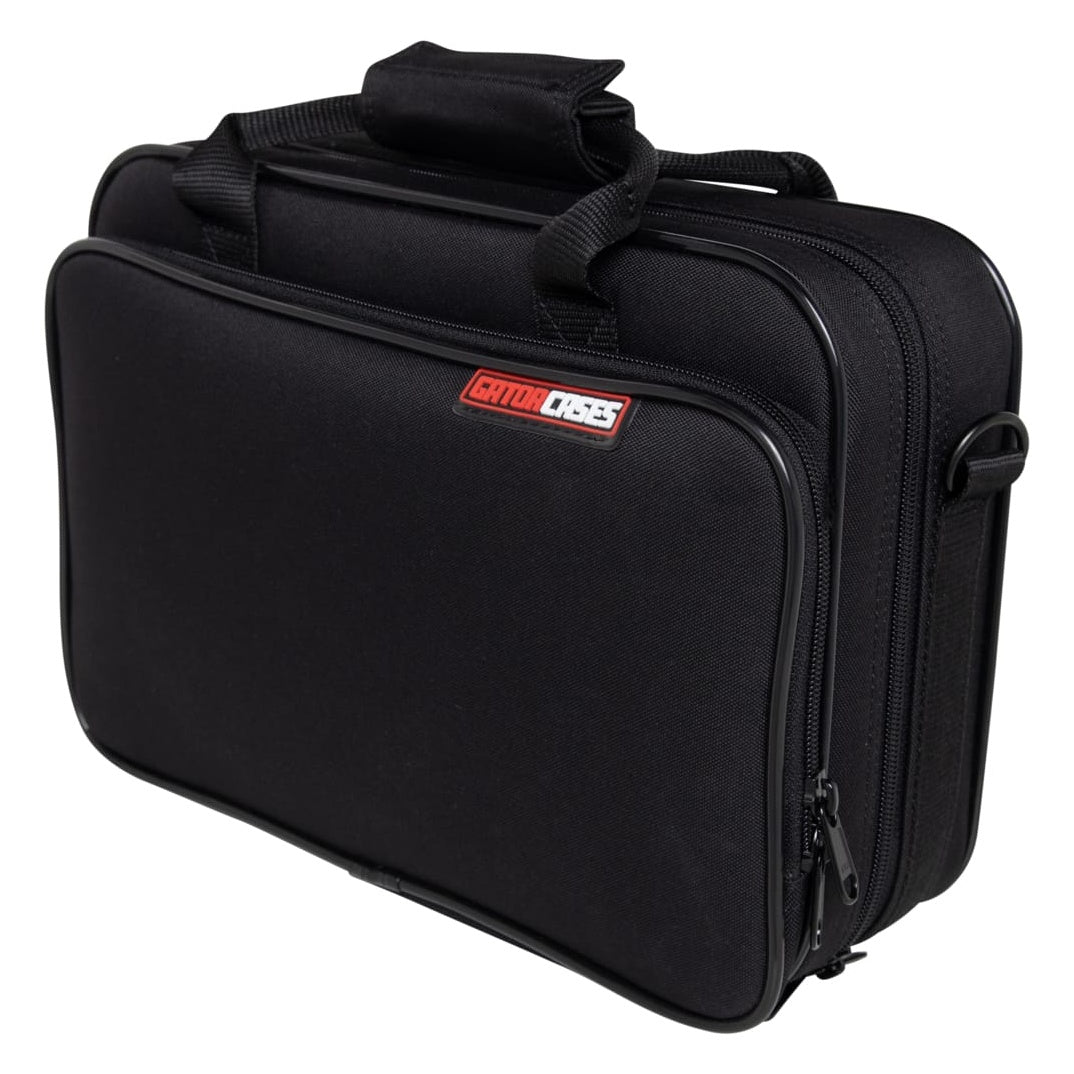 GBB-OBOE oboe case angled front view showing Gator Cases logo patch, front zip pocket, top carry handle and side shoulder strap D-ring, Gator