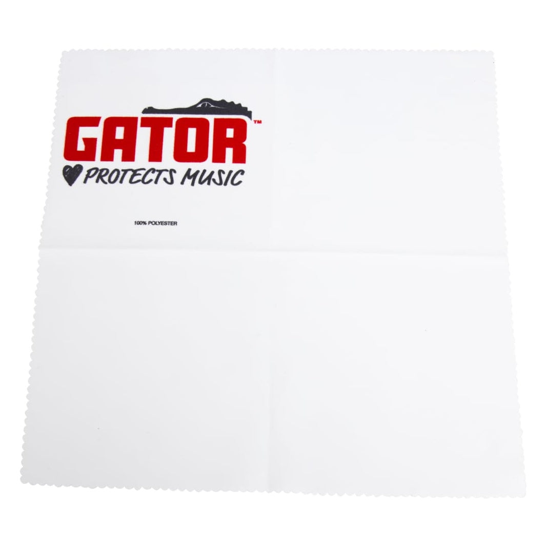 GBNO-POLISHCLOTH-GPM polishing cloth flat view showing scalloped edges, fold creases and red Gator Protects Music logo with 100% polyester label, Gator