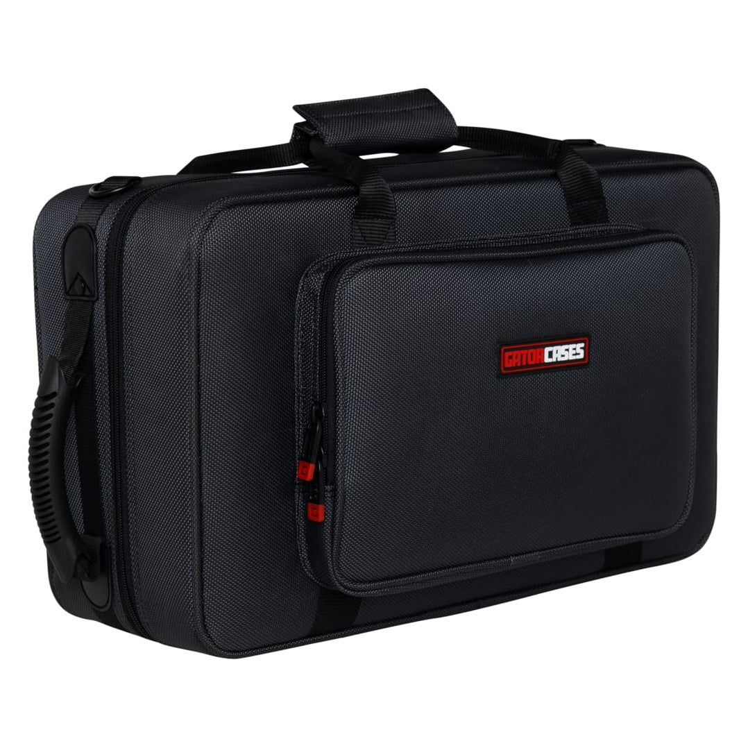 GL-CORNET-23 cornet case angled front view showing molded side handle, shoulder strap ring and front pocket with Gator Cases logo, Gator