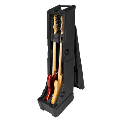 GTR-MINIVAULT-B2 mini vault open angled view with two electric bass guitars stored upright in foam-lined cavity, latches and top carry handle visible, Gator