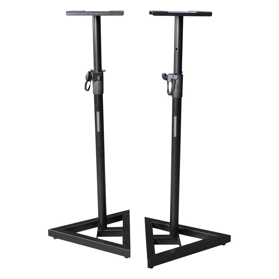 RI-SPK-SM20-TRI studio monitor stand pair, front three-quarter view showing triangular steel bases, height-adjustable poles with locking clamps and flat top plates, Gator
