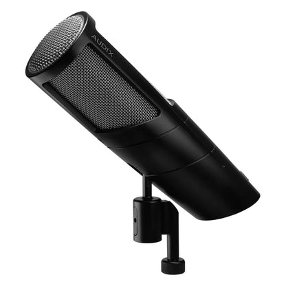 PDX520 angled view mounted on a desk-style stand clamp, showing the side-address mesh grille and AUDIX logo, Audix