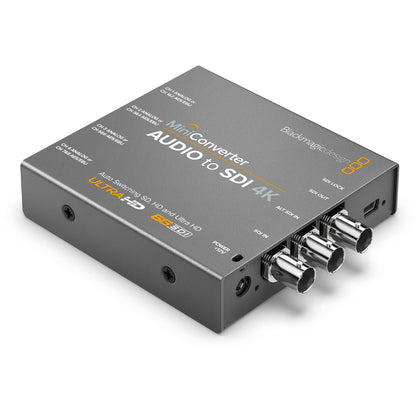 Blackmagic Design Mini Converter Audio to SDI 4K angled view showing BNC connectors and labeled top panel
