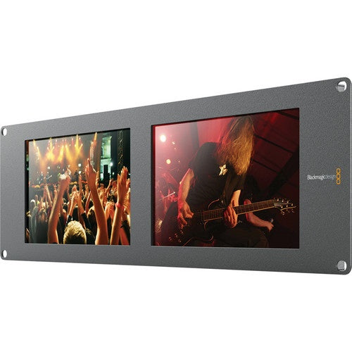 Blackmagic Design SmartView Duo angled view of rack-mount dual monitor showing live concert footage on both screens