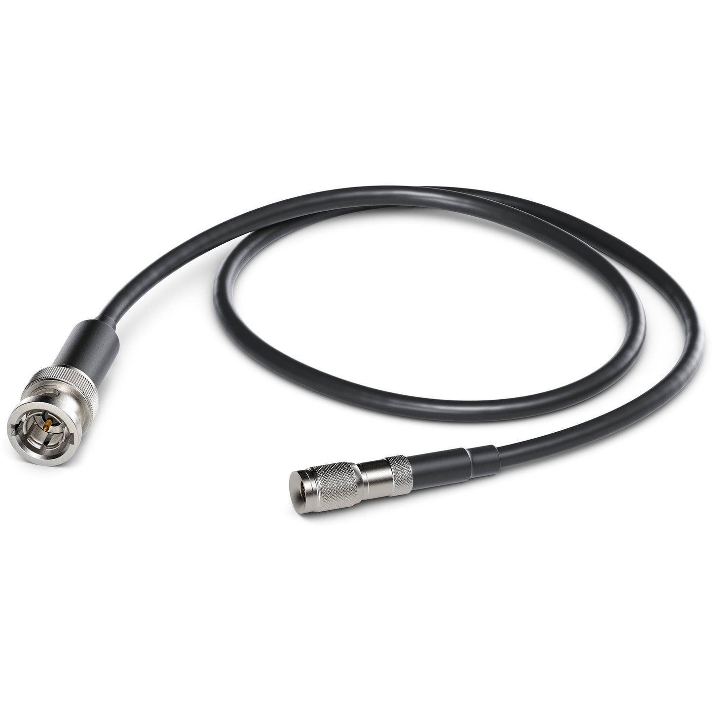Blackmagic Design DIN 1.0/2.3 to BNC male adapter cable coiled, showing both metal connector ends