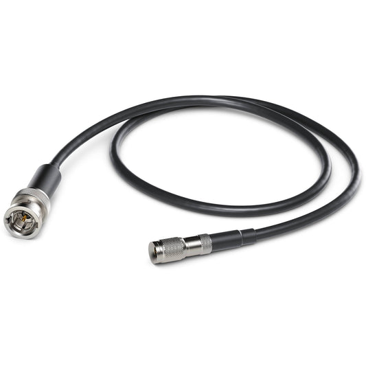 Blackmagic Design DIN 1.0/2.3 to BNC male adapter cable coiled, showing both metal connector ends