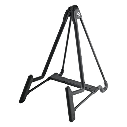 17581 Heli 2 guitar stand angled front view with A-frame legs and padded cradle arms, K&M