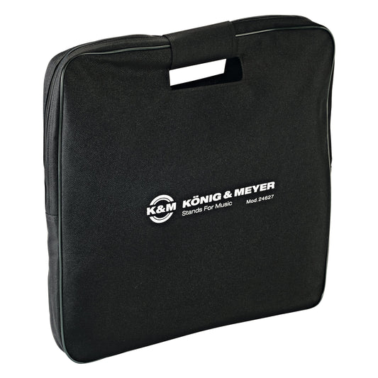 246 Series base plate carrying case, size L 560 x 560 mm, front three-quarter view in black nylon with cut-out carry handle and white König & Meyer Mod. 24627 logo, K&M