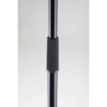 26125 mic stand height adjustment detail showing ribbed black clutch collar on telescoping shaft, K&M