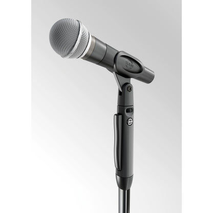 26200 Elegance One-Hand mic stand head detail with dynamic microphone held in clip, K&M logo and release grip visible, K&M
