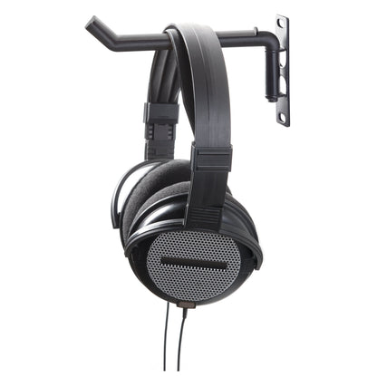 49302 headphone holder in use with over-ear headphones hanging from the black swivel arm, K&M