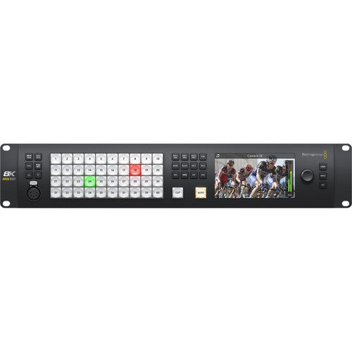 Blackmagic Design ATEM Constellation 8K front panel with numbered source buttons, transition keys and monitor