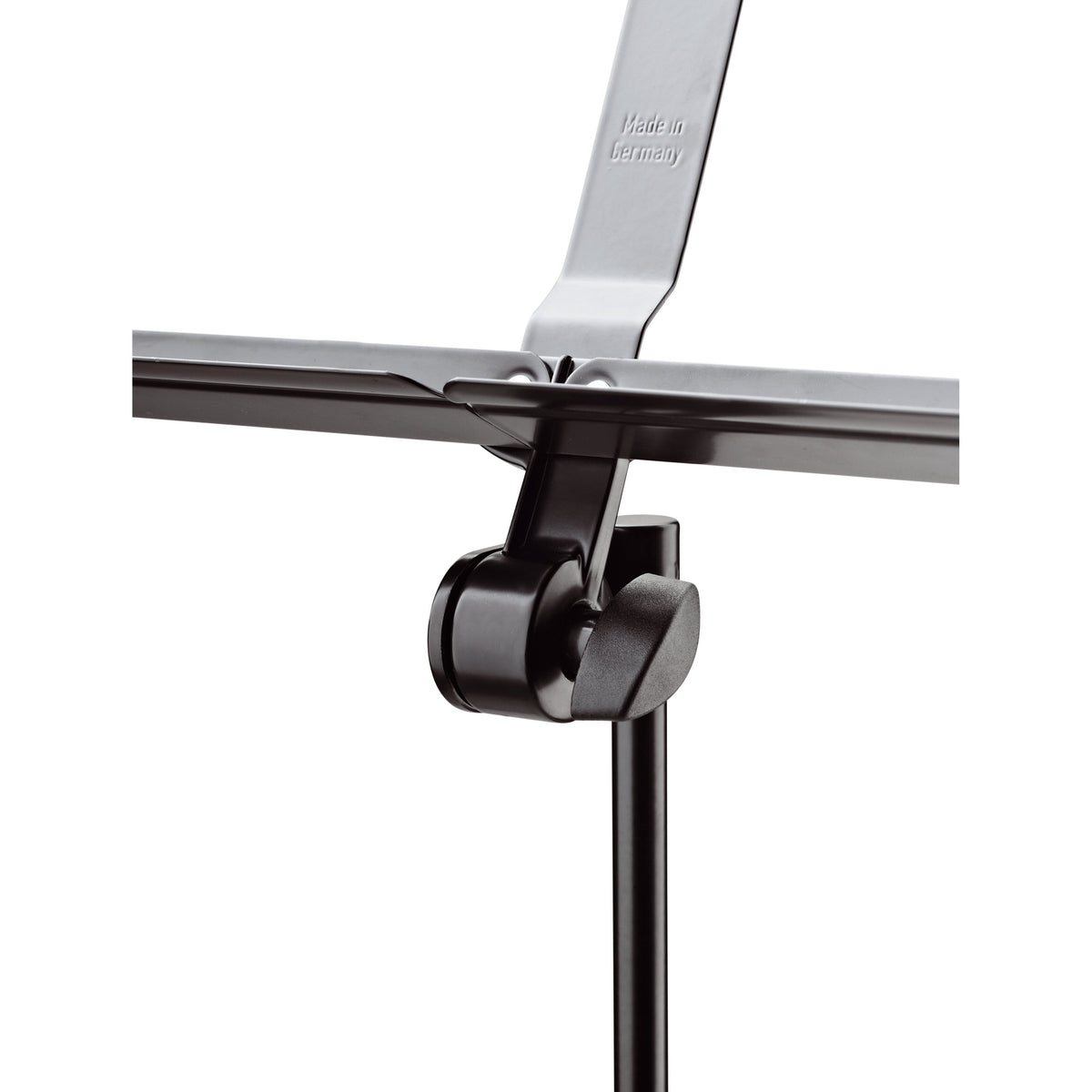 10065 music stand desk pivot joint close-up showing black tilt clamp with wing knob and Made in Germany embossing, K&M