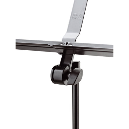 10065 music stand desk pivot joint close-up showing black tilt clamp with wing knob and Made in Germany embossing, K&M