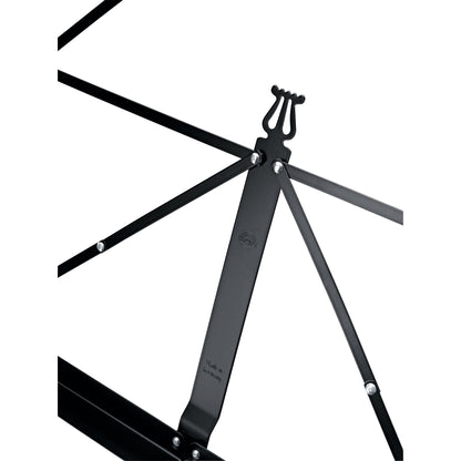 101 music stand desk close-up showing lyre-shaped top, riveted folding struts and Made in Germany stamp on center support, K&M