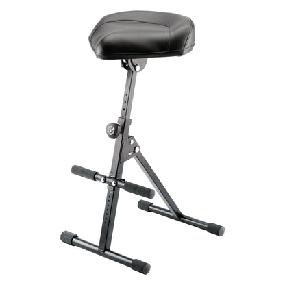 14047 performer stool angled front view with black vinyl seat, K&M locking knob and A-frame tubular legs with rubber foot caps, K&M