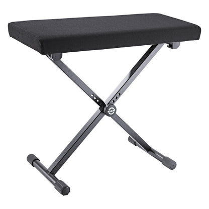 Wide keyboard bench three-quarter view with black fabric seat and X-frame steel legs with K&M logo pivot, K&M