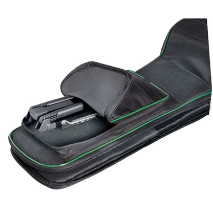17550 Memphis Travel folding guitar stand packed flat in the external zippered pocket of a black gig bag with green piping, K&M