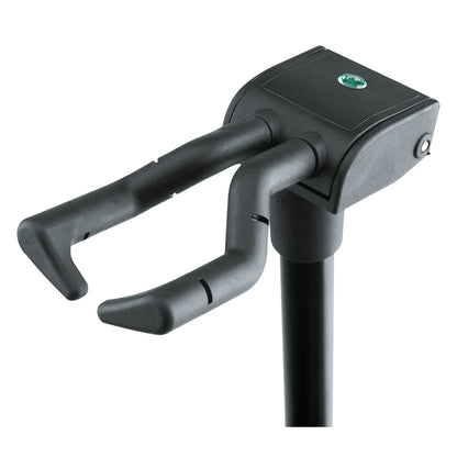 17670 guitar stand locking neck clamp detail in closed position with rubber-coated arms and green K&M badge, K&M