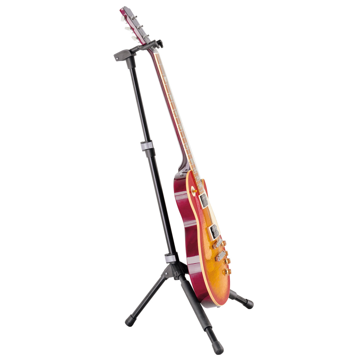 17670 folding guitar stand side view supporting a cherry sunburst Les Paul style electric guitar by the neck, K&M