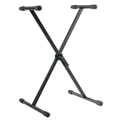 18930 X-Stand keyboard stand front view showing black crossed steel legs with padded support tubes and center pivot, K&M