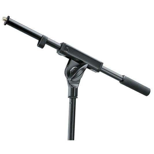 21160 short boom arm angled side view mounted on a tripod stand pole, showing threaded mic tip, cable clip, pivot clamp with locking wing knob and ribbed counterweight grip, K&M