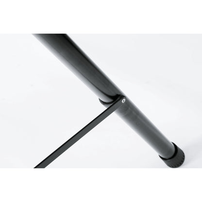 21436 speaker stand leg detail showing the flat brace strut riveted to the black aluminum leg tube above the rubber foot, K&M