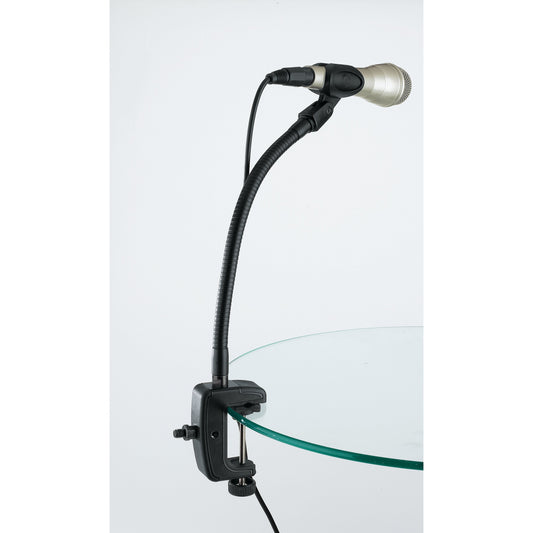23720 table clamp in use on a glass tabletop holding a gooseneck with a handheld microphone, K&M