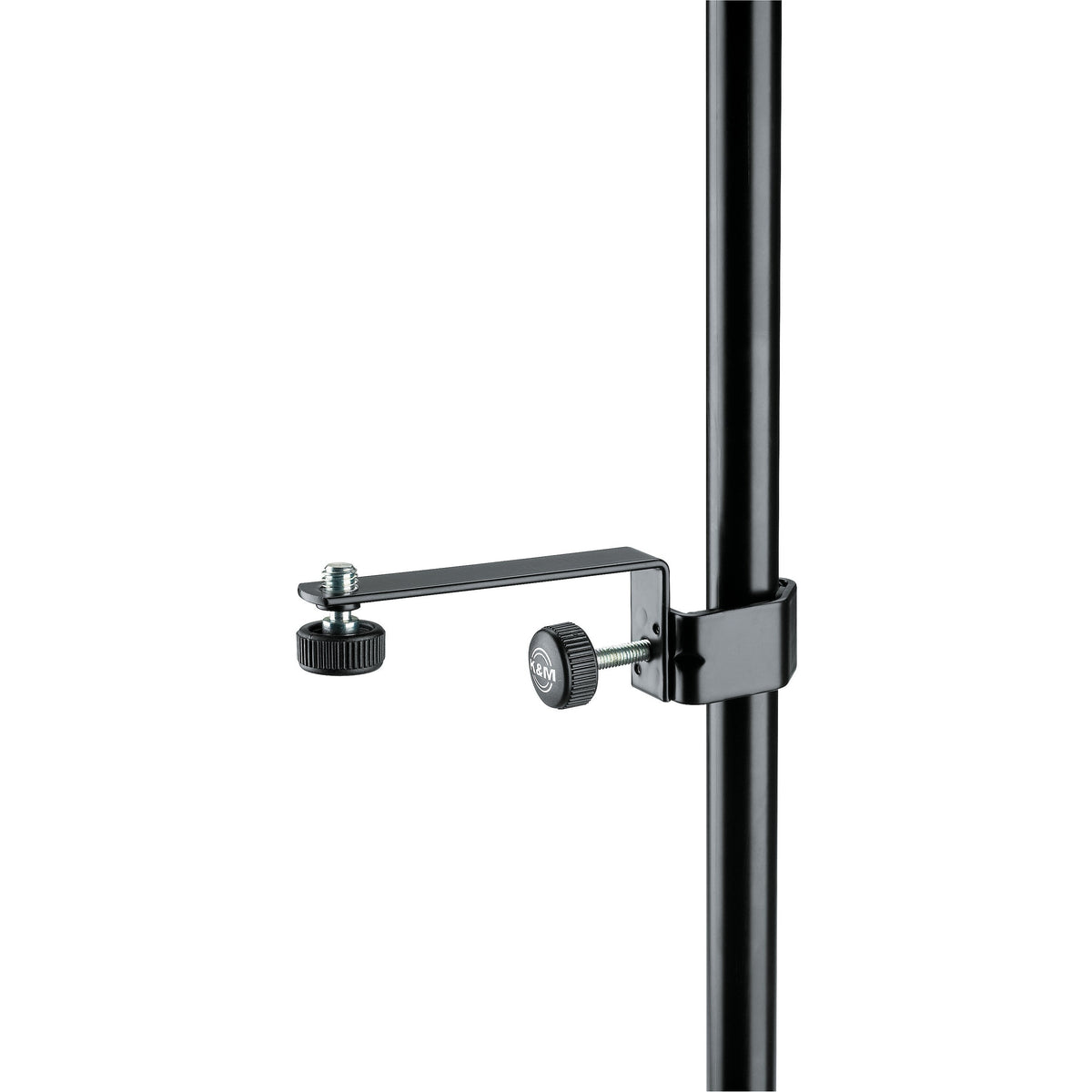 23800 steel microphone holder clamped to a vertical speaker stand pole, showing the black L-shaped arm, threaded mic mount stud with knurled nut and K&M-branded clamp screw knob, K&M