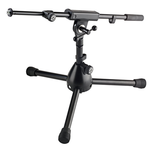 25950 extra low tripod mic stand front three-quarter view with telescoping boom arm, counterweight grip and rubber-capped tripod legs, K&M