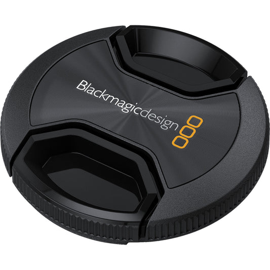 Blackmagic Design 58mm lens cap, angled view showing center pinch tabs and ridged edge
