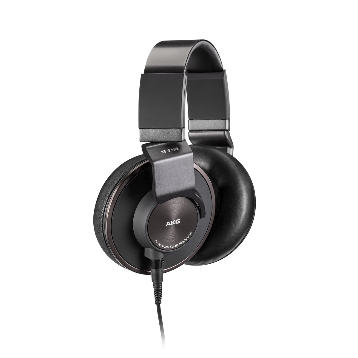 K553 MKII angled view of closed-back earcups showing swivel yokes and strain-relieved cable entry, AKG