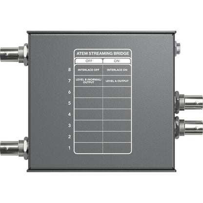 Blackmagic Design ATEM Streaming Bridge underside showing DIP switch setting chart for interlace and output level
