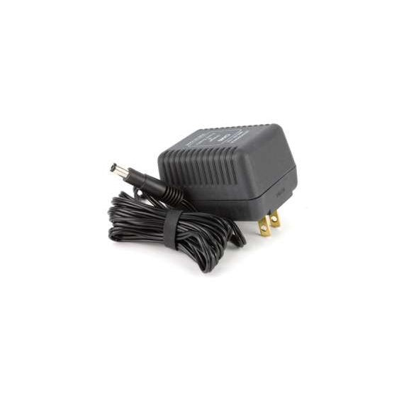 CH40 AC power adapter angled view showing black wall-plug body with brass prongs and coiled DC cable with barrel connector, Lectrosonics