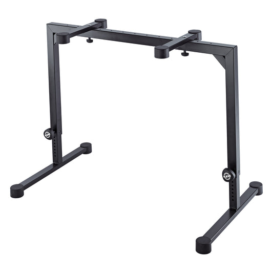 18810 Omega table-style keyboard stand front three-quarter view in black steel with adjustable legs and K&M clamping knobs, K&M