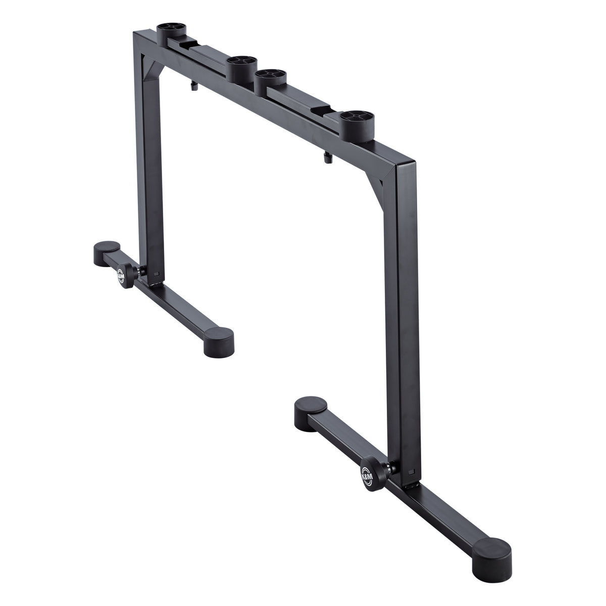 18810 Omega keyboard stand rear angled view showing top rail with four mounting sockets for add-on accessories and folded-in feet, K&M