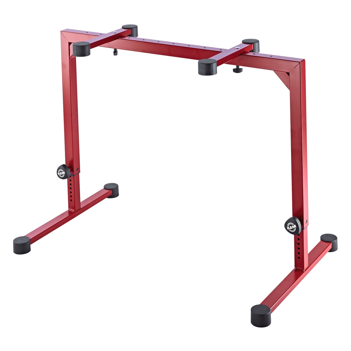 18810 Omega table-style keyboard stand front three-quarter view in ruby red with extended legs, adjustment knobs and black rubber support pads, K&M