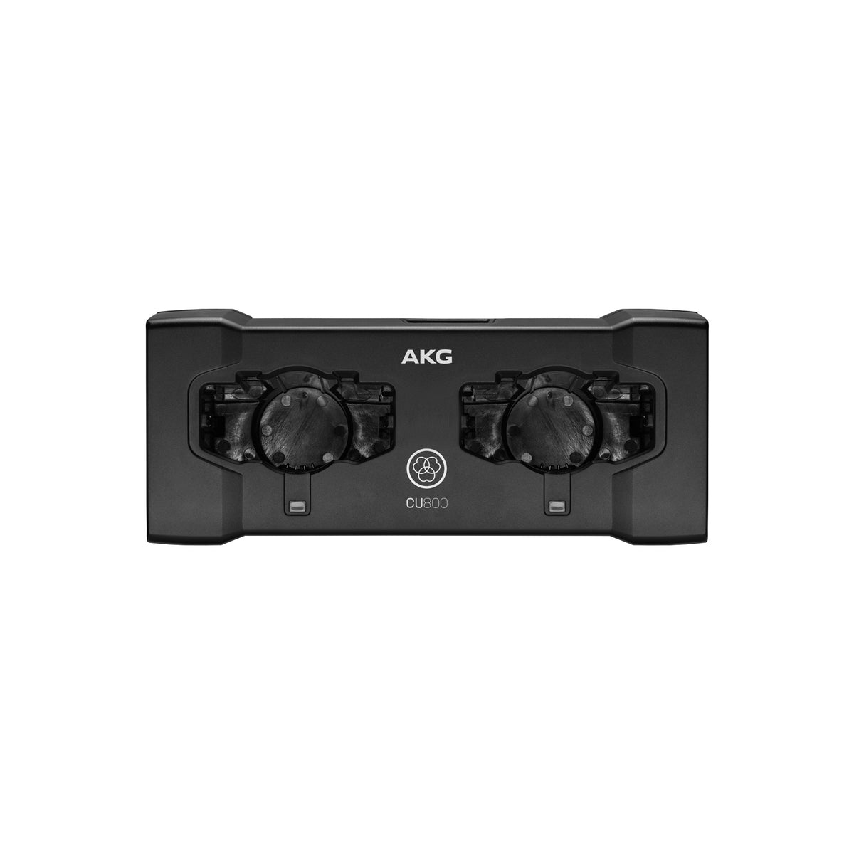 CU800 top view showing two empty charging bays with contacts and status LEDs, no adapters fitted, AKG