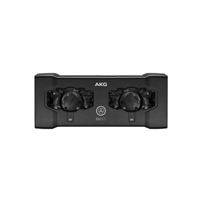CU800 top view showing two empty charging bays with contacts and status LEDs, no adapters fitted, AKG