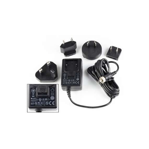 DCR12-A5U universal DC power supply with four interchangeable plug adapters (UK, EU, AU, US) and coiled cable with locking connector, inset showing regulatory markings on the label, Lectrosonics