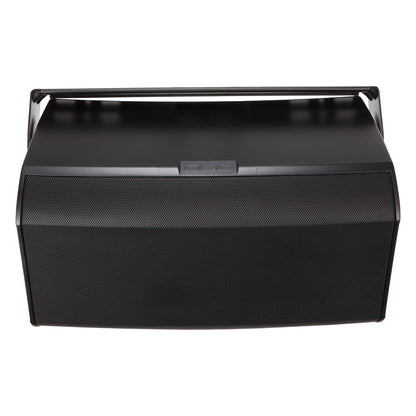 AD-S12 yoke mount in black front view showing U-bracket spanning the top of the perforated steel grille cabinet, Q-SYS