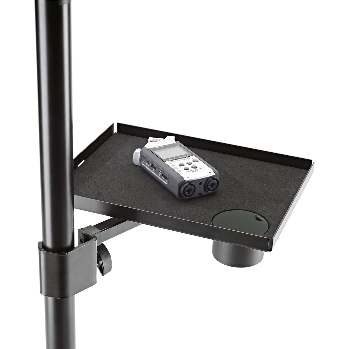 12227 equipment tray in use clamped to a stand pole with a handheld audio recorder on the foam-lined shelf, K&M