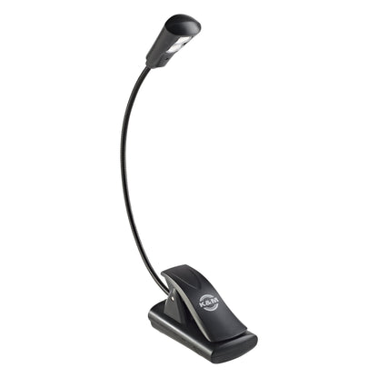 12242 LED music stand flex light front view on white background showing black gooseneck, lamp head and clip base with K&M logo, K&M