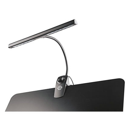 12295 music stand light clipped to the edge of a black music desk, unlit LED bar on gooseneck with dimmer knob on clip, K&M