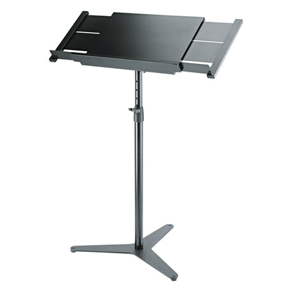 12338 conductor stand on flat three-arm base with desk extended to full width, side extensions and slotted panels visible, K&M