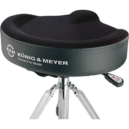 KM 14036.000.02 drum throne seat detail showing Konig & Meyer logo on vinyl trim and red height-adjust lever, K&M